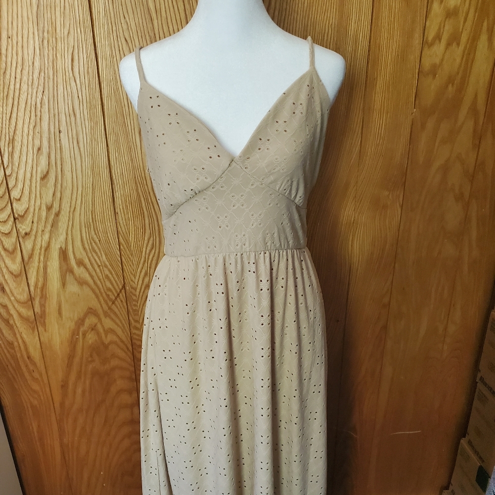 NWOT No Comment spaghetti strap beige dress with eyelit cutouts. Brand new.